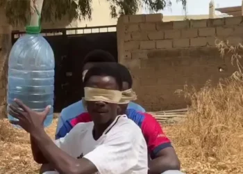 blindfolded prank game video with friends reacting to swinging bottle