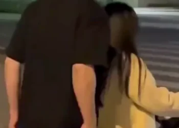 Funny fail videos compilation showing people slipping, tripping, and falling with a cartoon reaction face for comedic effect